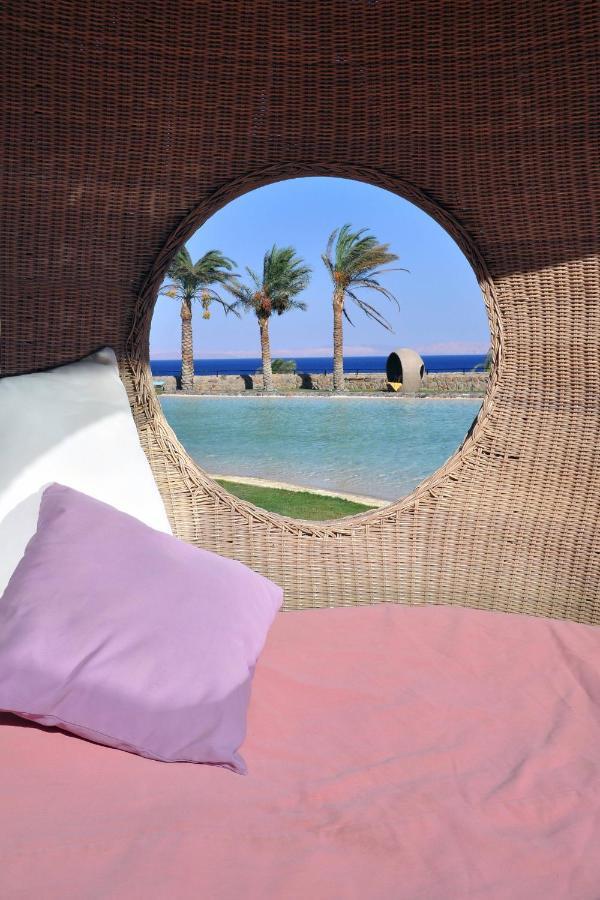 Retac Qunay Dahab Resort & Spa Екстериор снимка View of the pool at the hotel