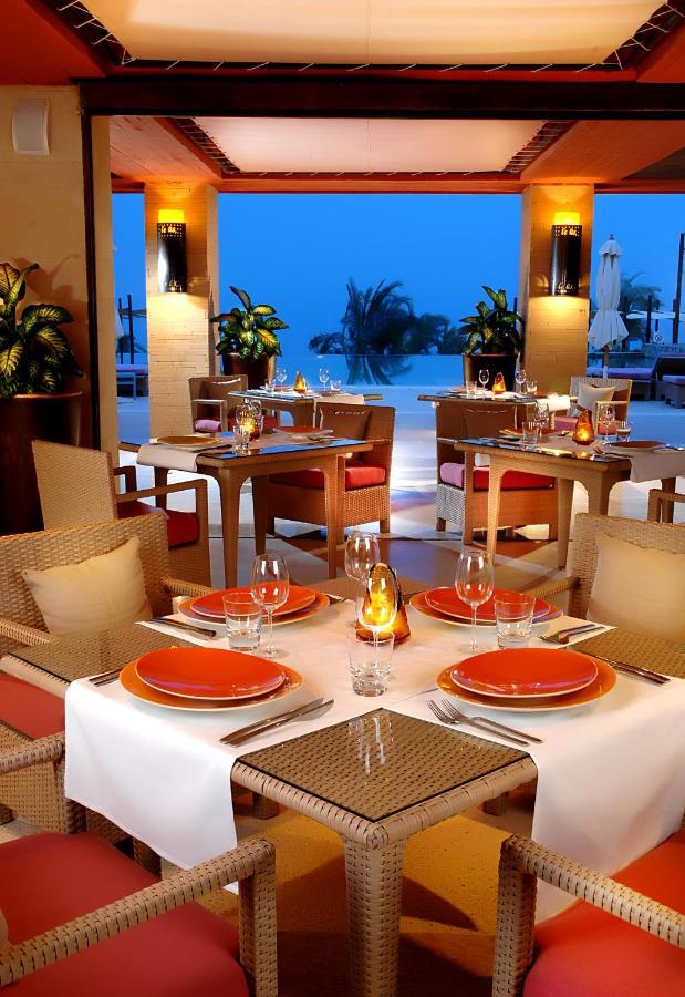 Retac Qunay Dahab Resort & Spa Екстериор снимка A restaurant at the Atlantis Paradise Island resort